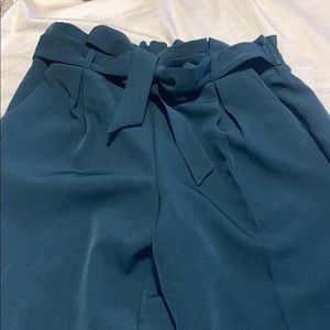 Cropped forest green pants.